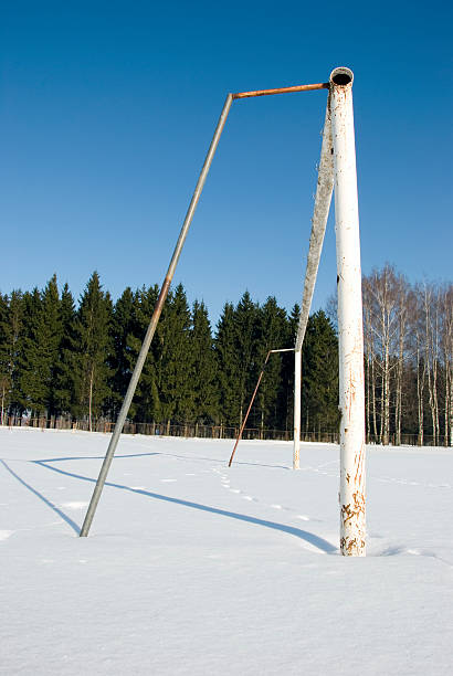 istock football stadium field with gate on  snow 187151575