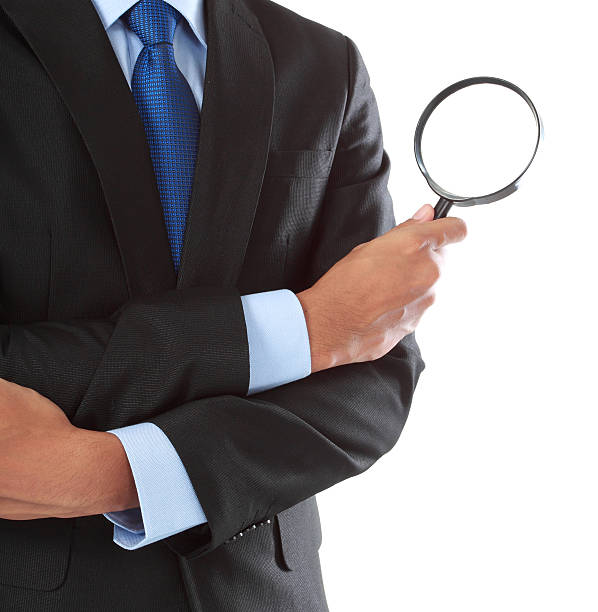 istock businessman with magnifying glass 187151948
