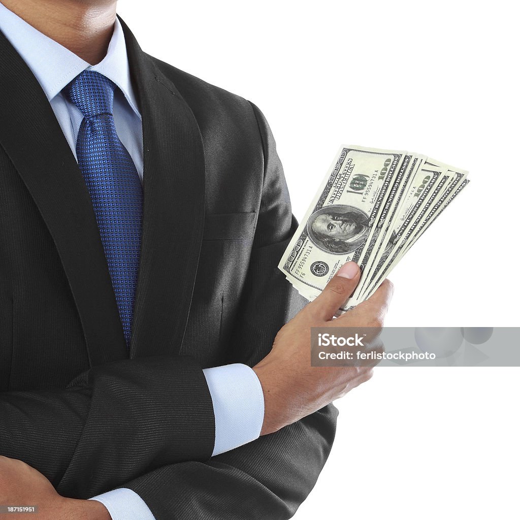 Hombre de negocios con dinero de la mano - Foto de stock de Actividad comercial libre de derechos