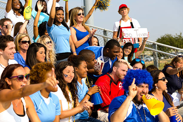 istock Sports: Fans cheer for their team during local sporting event. 187152733