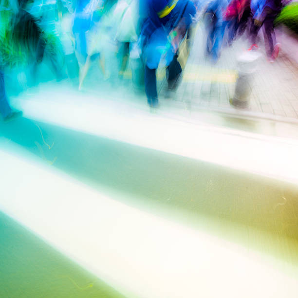 istock people crowd on zebra crossing street 187152741