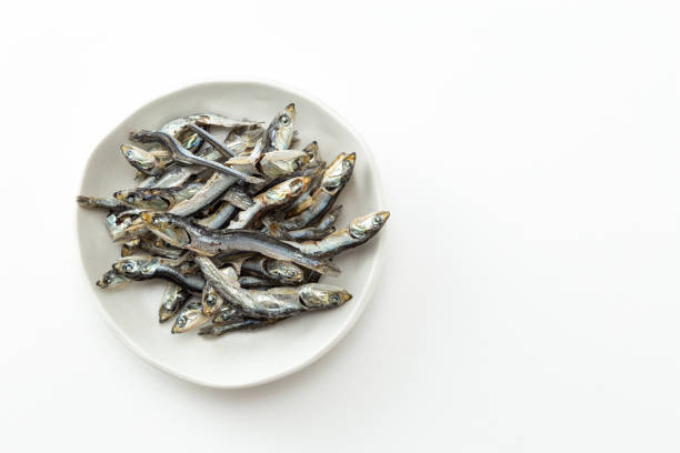 istock Dried sardines on a white background. 1871537290