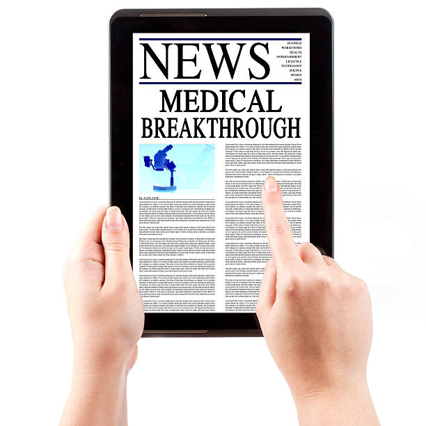 istock News on Tablet Computer - Medical Breakthrough 187154838