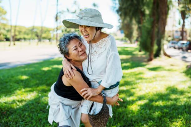 istock Vibrant senior women having fun together while on a walk 1871557736
