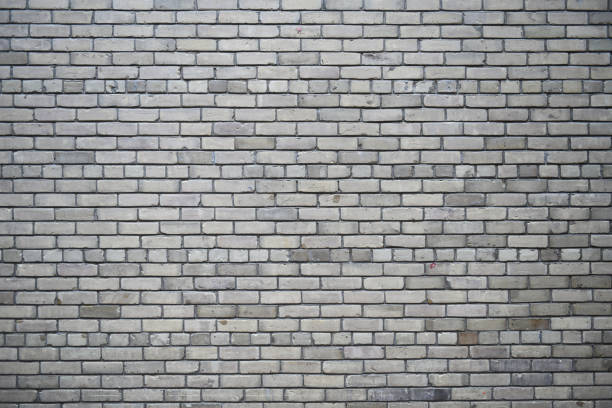 facade view of old grunge brick wall background
