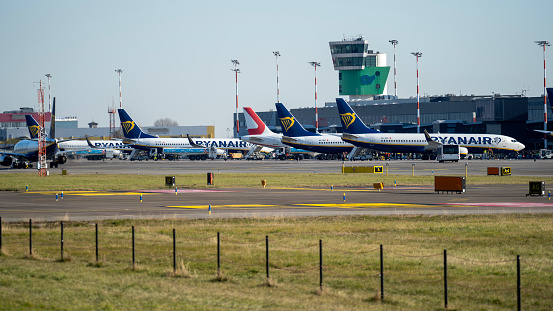 Bergamo, Italy. The Milan Bergamo international airport. View of the airport of the gates side. Airplanes at the gates