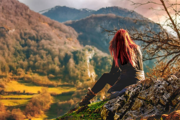 istock Redheaded girl in the mountains 1871567229
