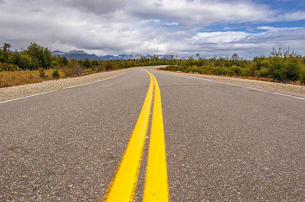 istock vibrant image of highway and blue sky 187157109