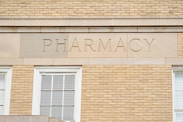 istock Engraved pharmacy sign on building 187157645