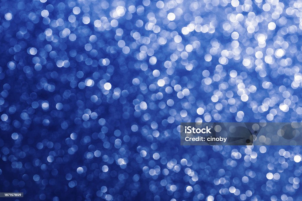 Blue Defocused Glitter Background Photography of a defocused glitter background. Abstract Stock Photo