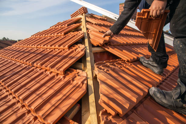 istock Roofing work, new covering of a tiled roof 1871605631