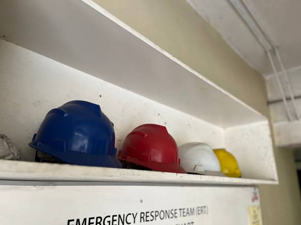 istock Colorful safety helmet on floating shelf 1871618127
