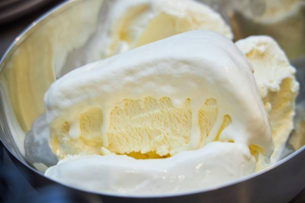 istock Ice cream in a metal bowl. An ingredient for making desserts. 1871629085