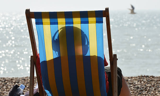 istock Listening on the beach 187163015
