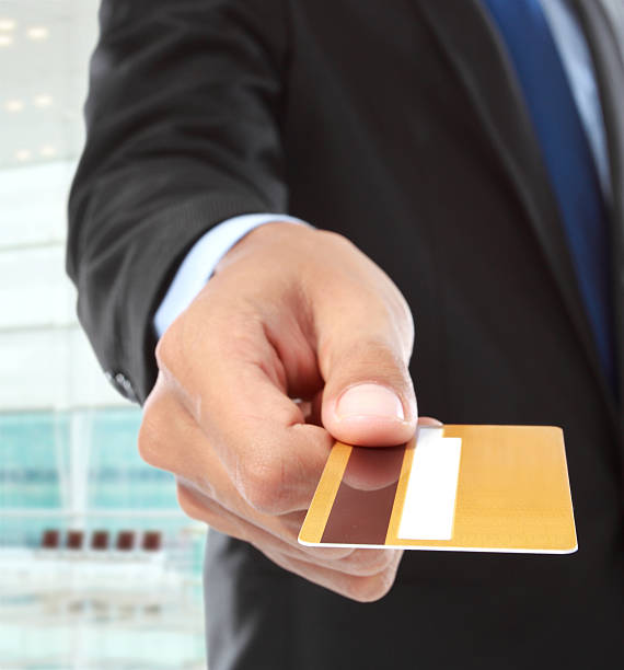 istock A business man paying for goods with a card  187164624