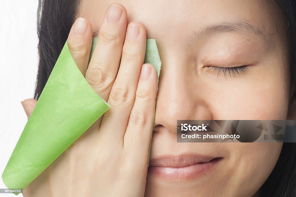 Woman oily skin Woman face with oily skin removing oil Cooking Oil Stock Photo