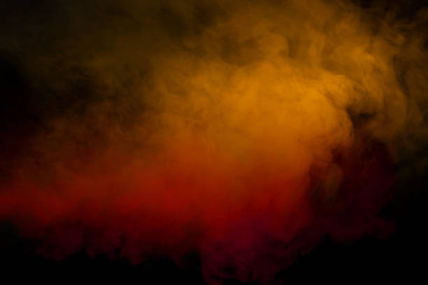 istock Orange and red steam on a black background. 1871659459