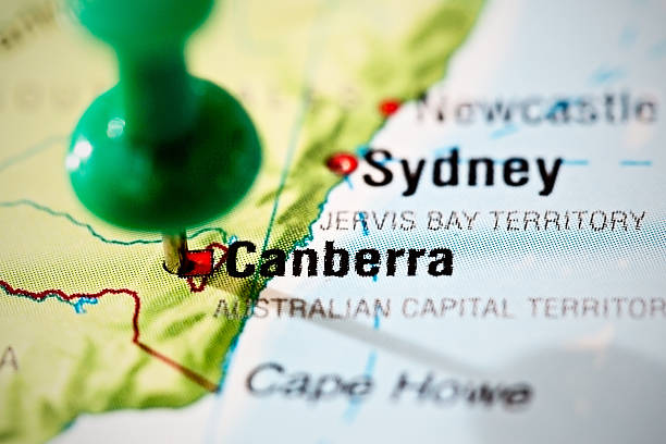 istock Green pushpin marks Canberra on map of Australia 187166409