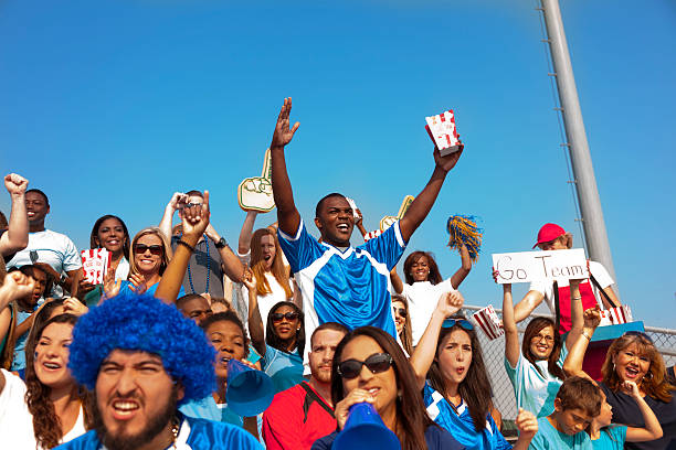 istock Sports: Fans cheer for their team during local sporting event. 187166673