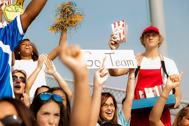 istock Sports: Fans cheer for their team during local sporting event. 187166984