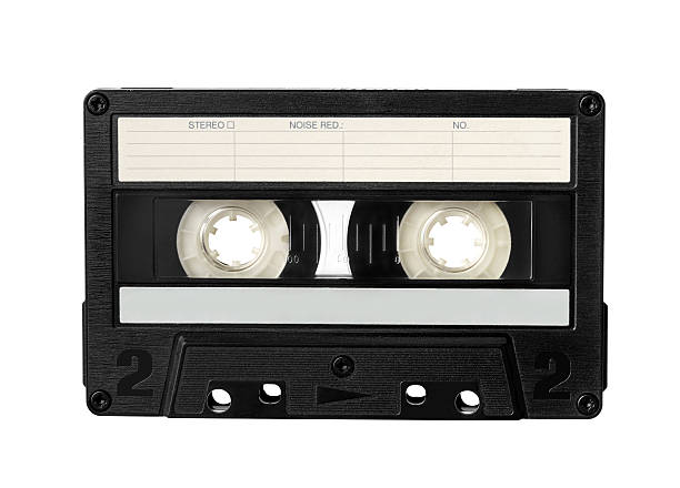 Black Audio cassette with blank label isolated Audio cassette from the 80s, little dust in detail alte algarve stock pictures, royalty-free photos & images