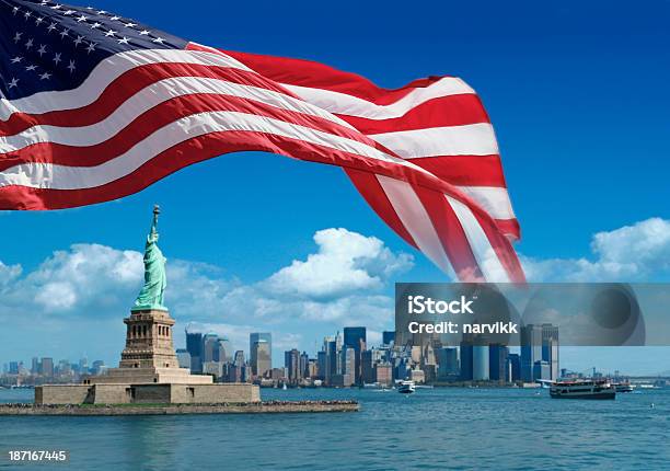 Us Flag And Statue Of Liberty With New York Behind Stock Photo - Download Image Now - USA, New York City, American Flag