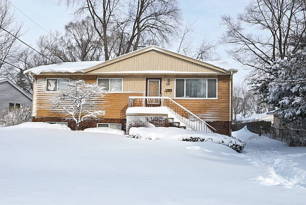 istock View of home in a suburb after  snow blizzard 187168656