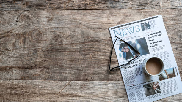 istock Newspaper on the wooden desk 1871689894