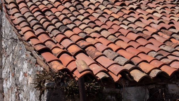 istock old roof tiles on roof 1871704356