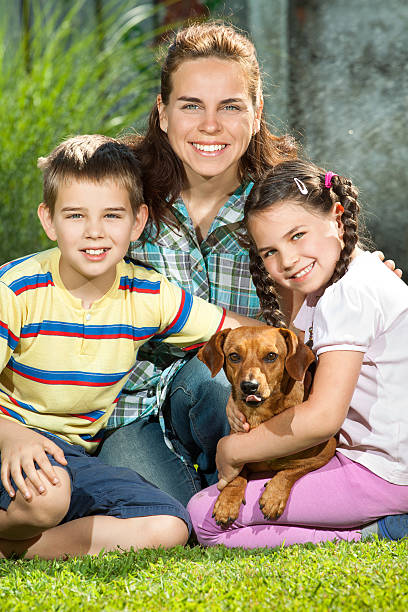 istock Happy family with a little dog 187170596