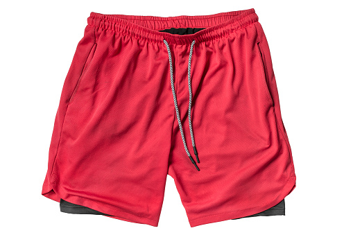 Red gym shorts isolated on white background