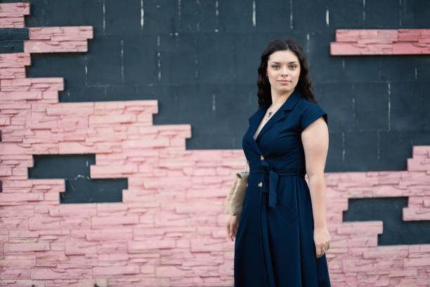 istock Woman looking at the camera with a serious look 1871731546