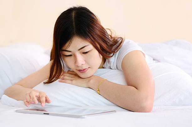 istock Asian teenage talking and chat with tablet 187174517