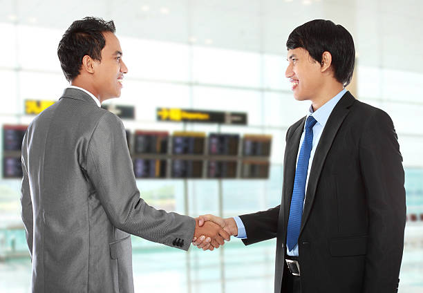 istock business colleagues shaking hands 187174571