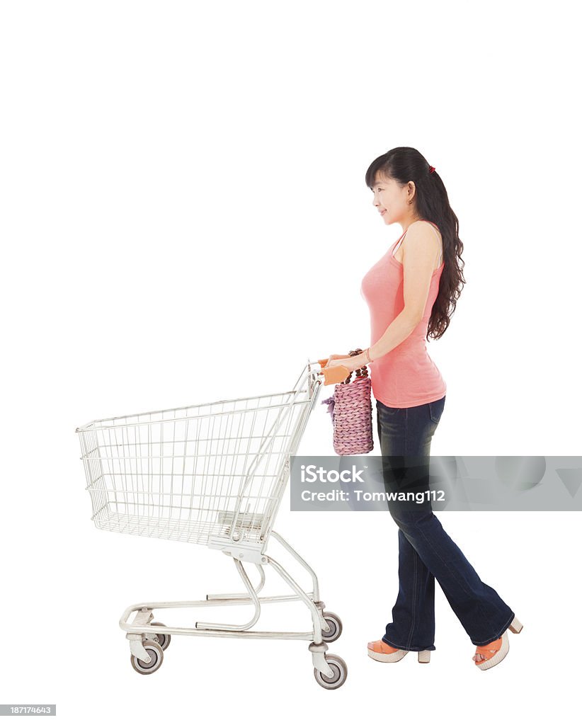 Jeune femme avec vide panier d'achats - Photo de Acheter libre de droits