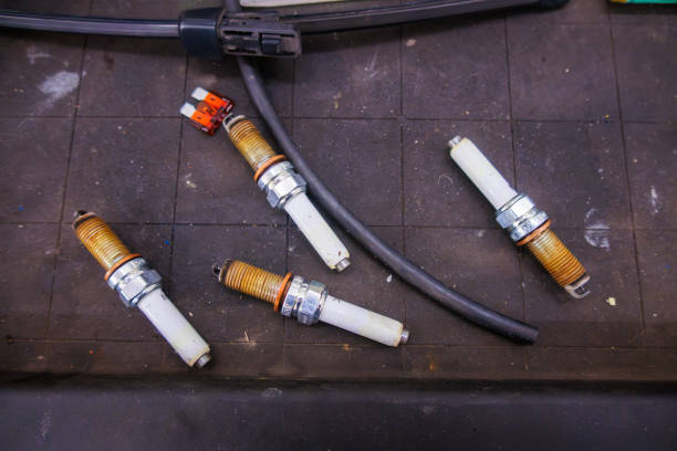 there are spark plugs removed in a workshop - spark plug electrode transportation workshop imagens e fotografias de stock