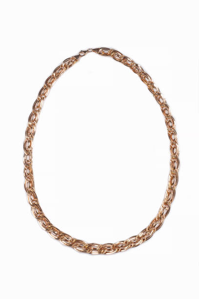 istock Silver gold macro pendant necklace with chain on white backround isolated 1871761609