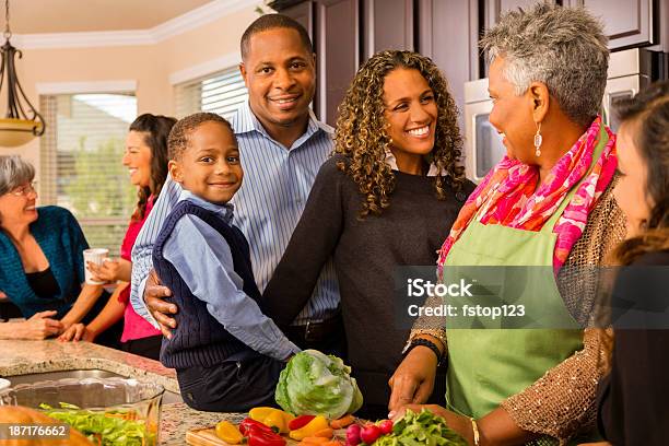 Relationships Multigeneration Family Prepares Dinner In Kitchen Stock Photo - Download Image Now