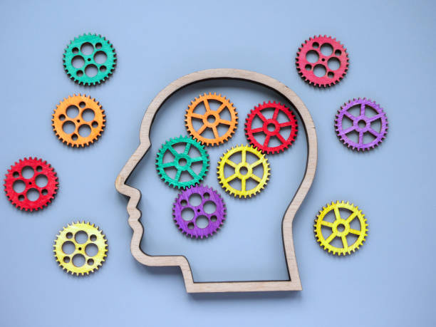 istock Autism and neurodiversity concept. Head and colored gears. 1871778480