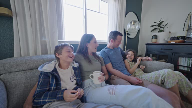 Happy family spending lazy morning together at home