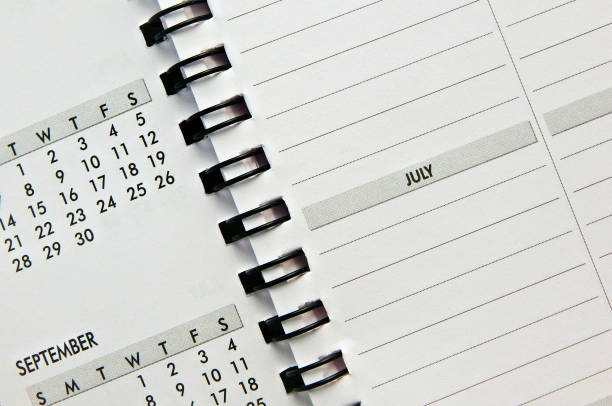istock view of pages in spiral bound monthly activity planner book or diary 1871795947