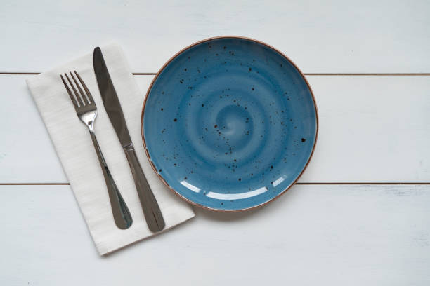 istock Empty plate and napkin on wooden 1871797513