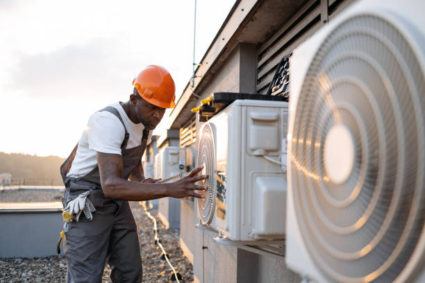 istock Male holding tablet and installing cooling system outdoors 1871802309