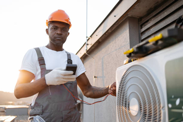 istock Man using tester for measuring strength in air conditioner 1871802317