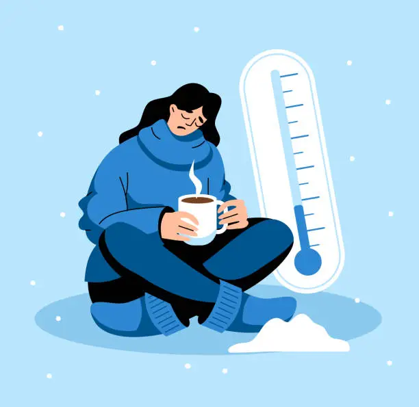 Vector illustration of The freezing Girl sits sad on the floor and drinks a drink. The thermometer shows a low temperature. Flat, cartoon, vector illustration. Winter, snow