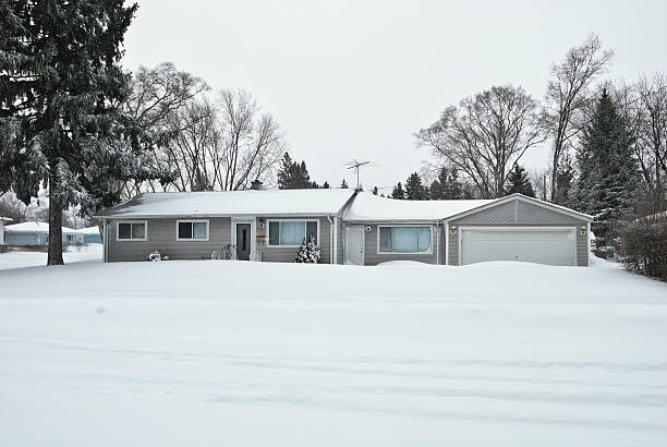 istock View of home in a suburb after  snow blizzard 187180598