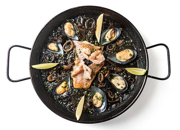 black paella (arroz negro) - pan stock-fotos und bilder