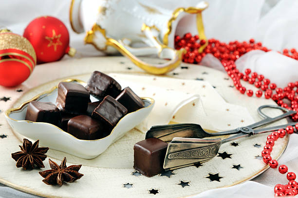 istock chocolate sweets domino on plate with christmas decoration 187180773
