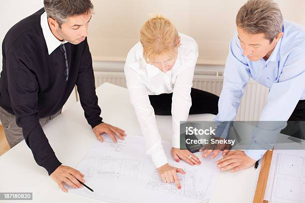 Three Architects Stock Photo - Download Image Now - Activity, Adult, Adults Only