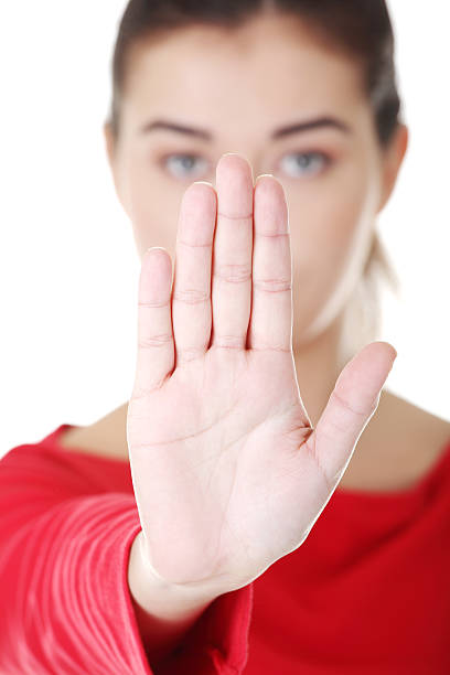 istock Attractive woman showing stop by hand. 187182696